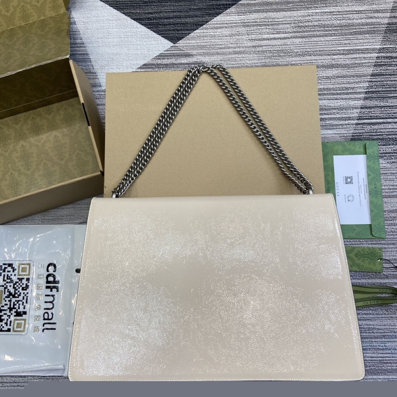 G*u*i top handle bags